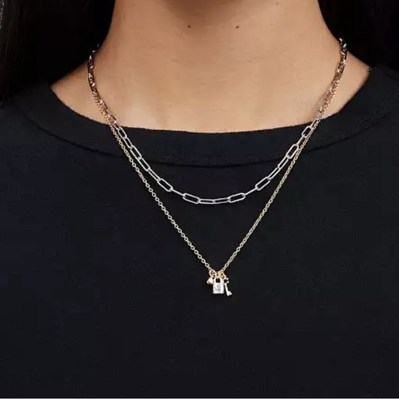 Coach Lock & Key layered charm necklace. Plated brass, cubic zirconia. - Picture 2 of 3